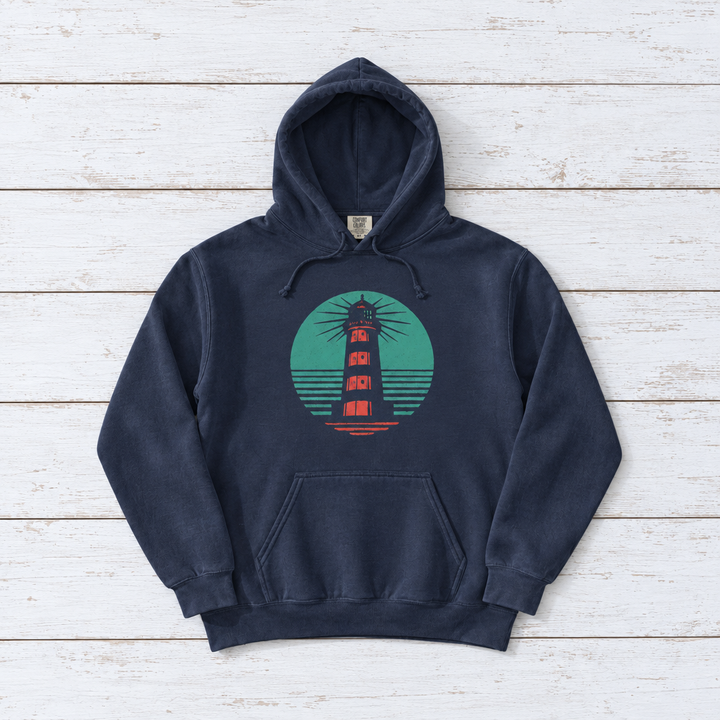 Coastal Lighthouse hoodie flat lay on whitewashed boards