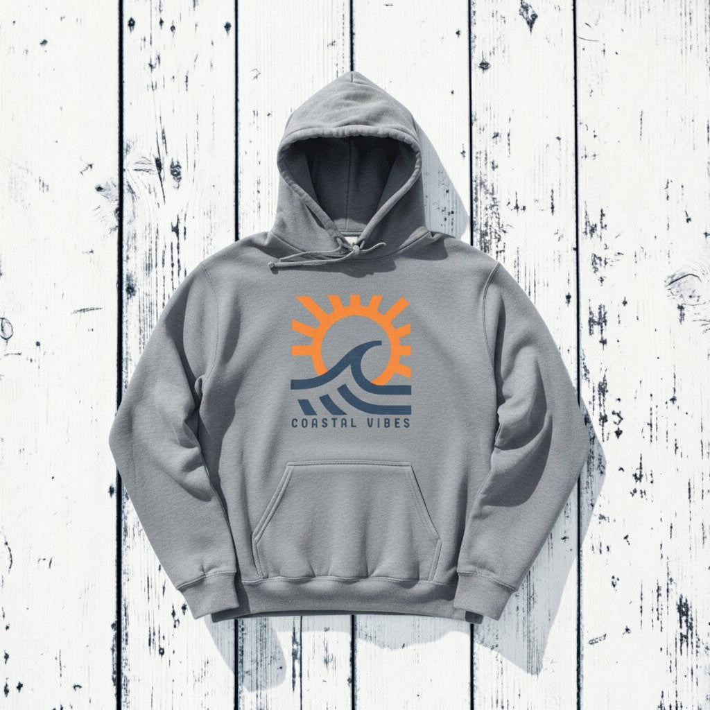 Coastal Vibes Hoodie in Grey — front graphic, warm sand studio background
