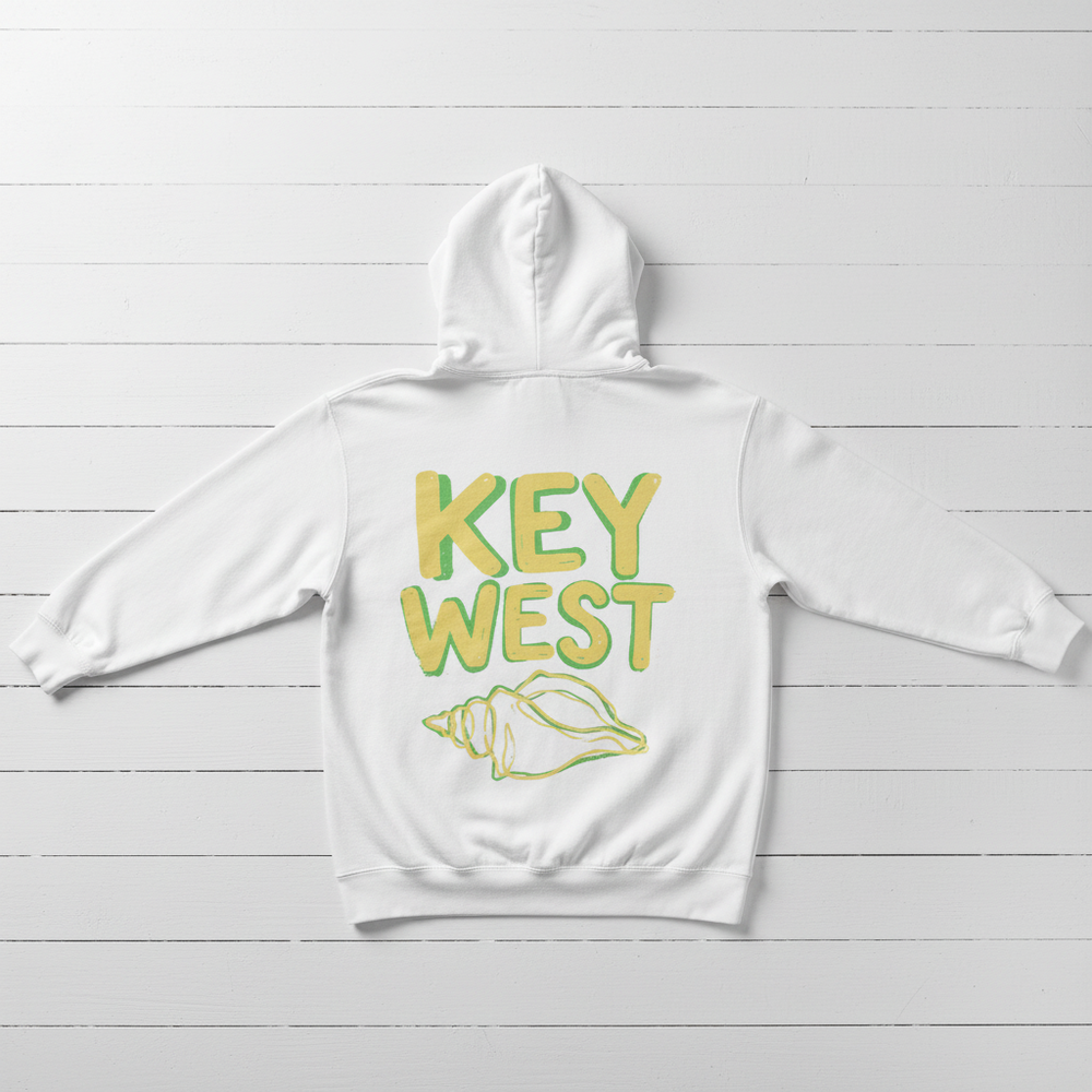 White Key West conch shell hoodie back flat lay on whitewashed boards