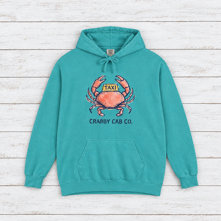 Crabby Cab Co. Grey and Seafoam hoodie flat lay on whitewashed boards