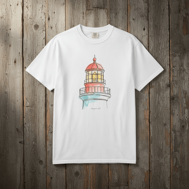 Lighthouse Watercolor white garment-dyed tee laid flat on rustic reclaimed wood