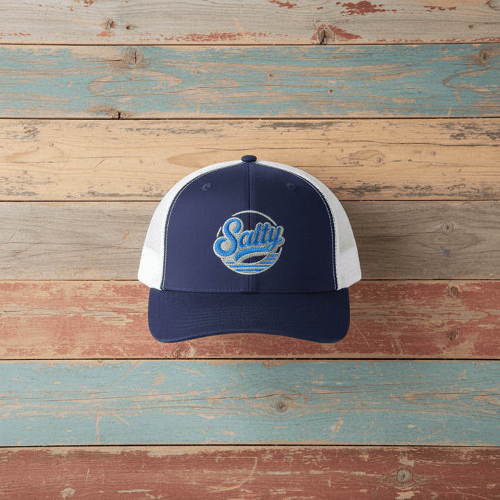 Salty Wave Snapback Trucker Cap navy white on faded driftwood planks