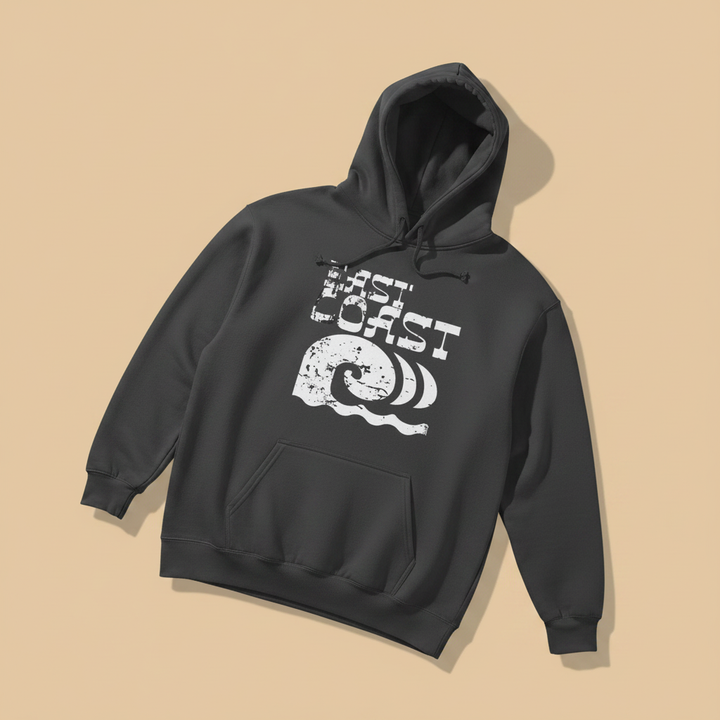 Coastal Vibes Hoodie in Pepper — front graphic, warm sand studio background