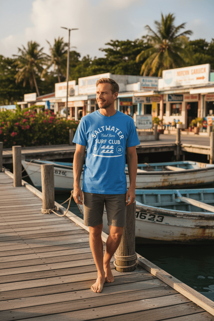 Male lifestyle - blue Saltwater Surf Club tee, tropical island dock
