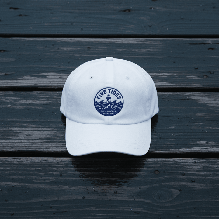 Five Tides Lighthouse Embroidered Dad Cap — White on Rain-Soaked Driftwood