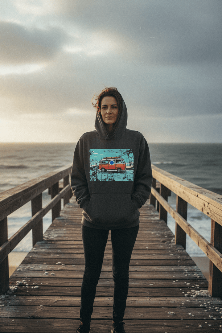 Woman in her late 30s wearing Retro Surf Van black hoodie on weathered beach dock