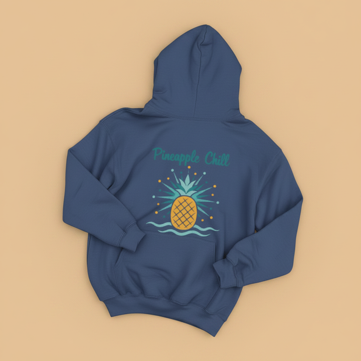Pineapple Chill Hoodie in True Navy — flat lay on warm sand studio background