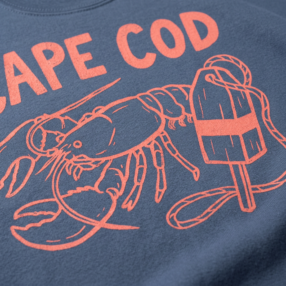 Cape Cod slate blue sweatshirt coral lobster and buoy graphic close-up