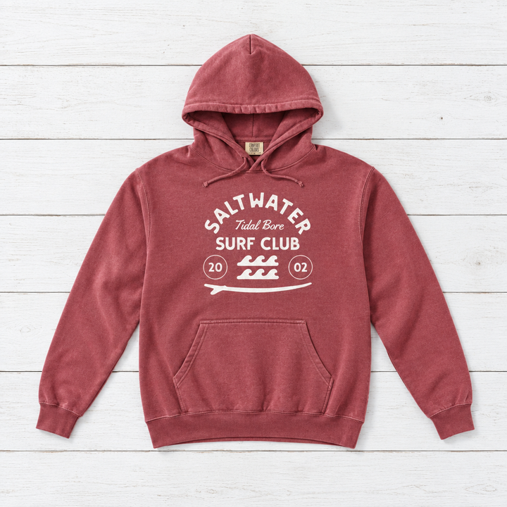 Crimson Saltwater Tidal Bore Surf Club hoodie front on whitewashed boards
