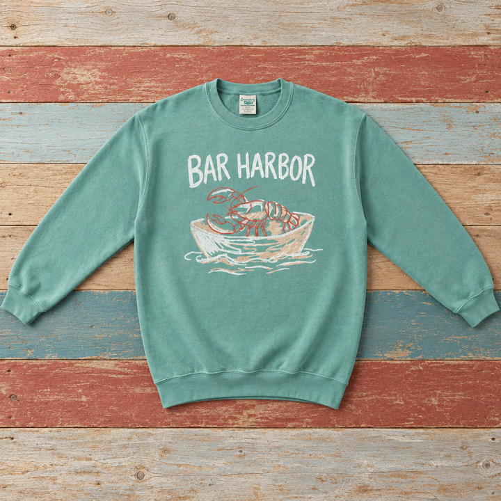 Bar Harbor lobster boat sweatshirt front in Seafoam on colorful weathered driftwood boards