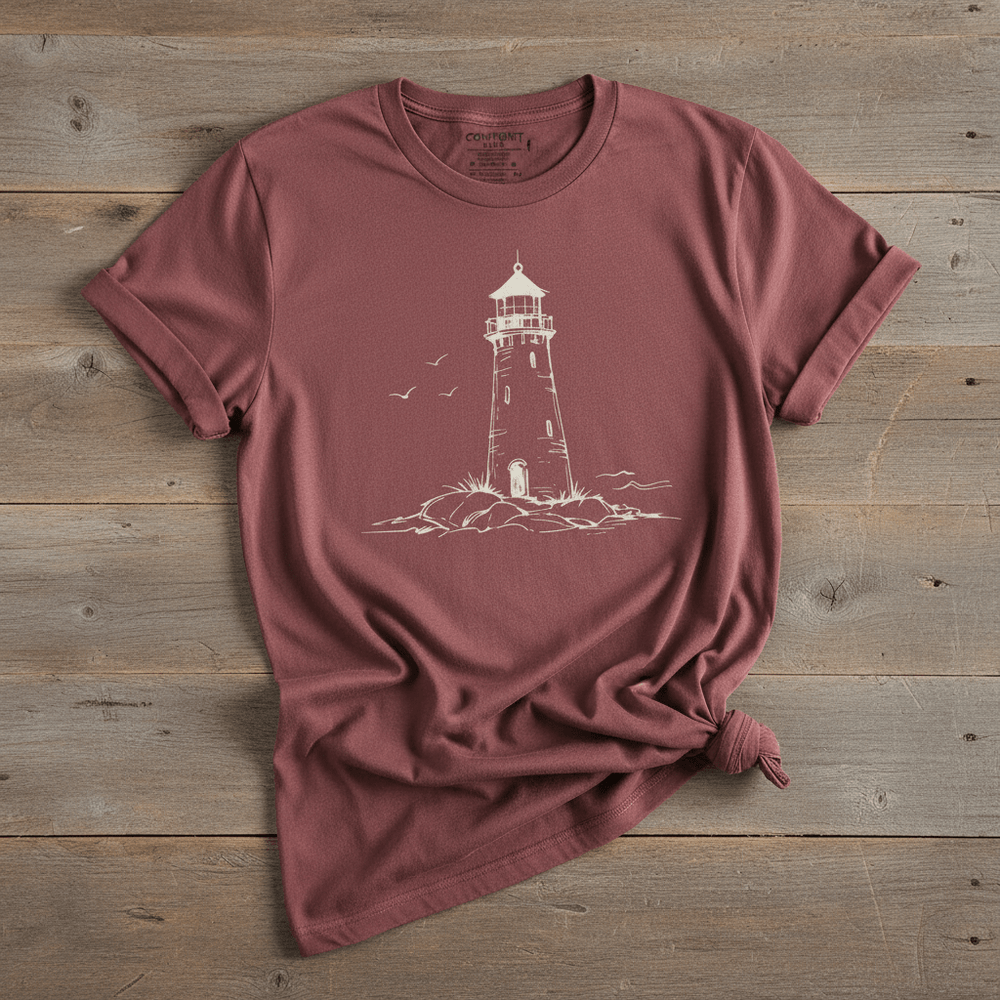 Atlantic Coast Lighthouse Sketch brick garment-dyed tee on weathered wood planks