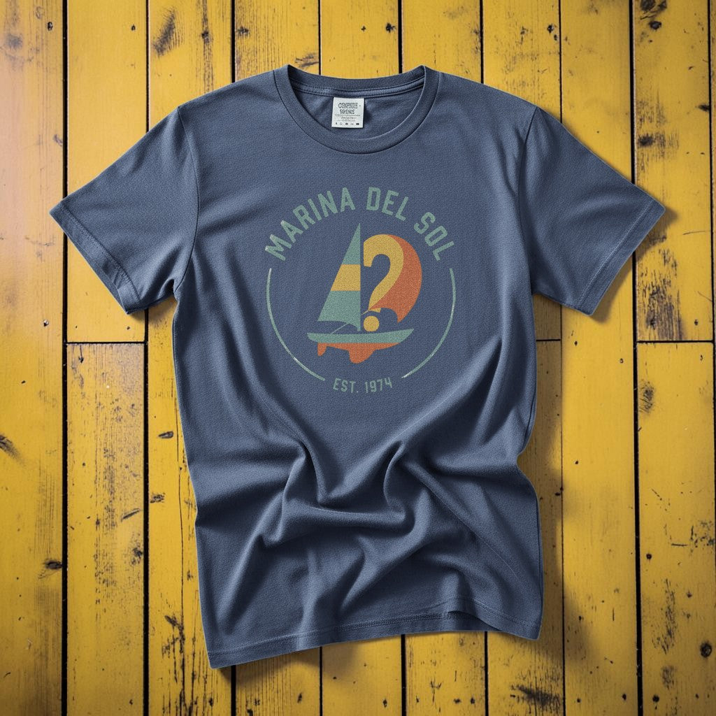Marina Del Sol Sailboat denim garment-dyed tee on weathered wood planks