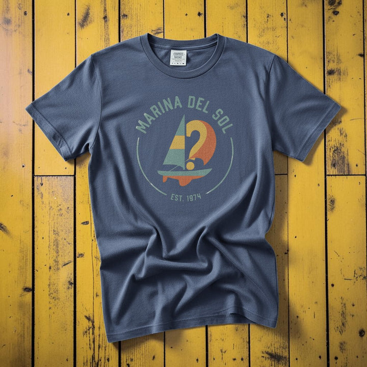 Marina Del Sol Sailboat denim garment-dyed tee on weathered wood planks