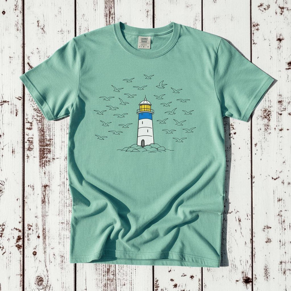 Lighthouse Coastal island reef garment-dyed tee on faded driftwood planks