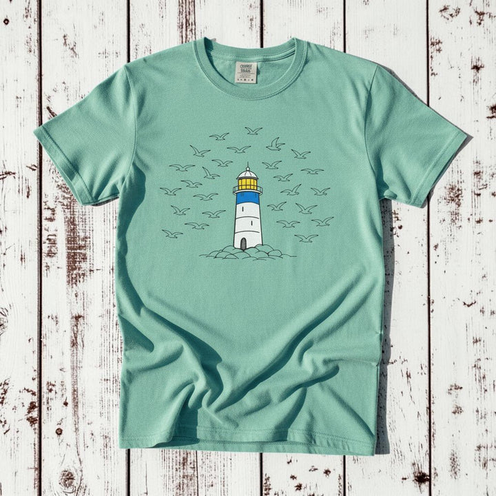 Lighthouse Coastal island reef garment-dyed tee on faded driftwood planks