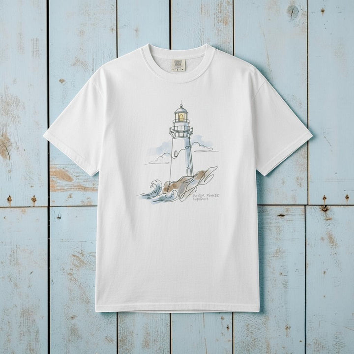 Lighthouse Sketch white garment-dyed nautical tee laid flat on rustic reclaimed wood