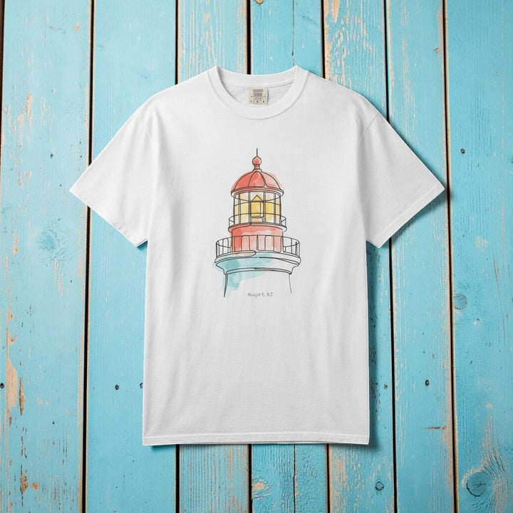 Lighthouse Watercolor white garment-dyed tee laid flat on rustic reclaimed wood