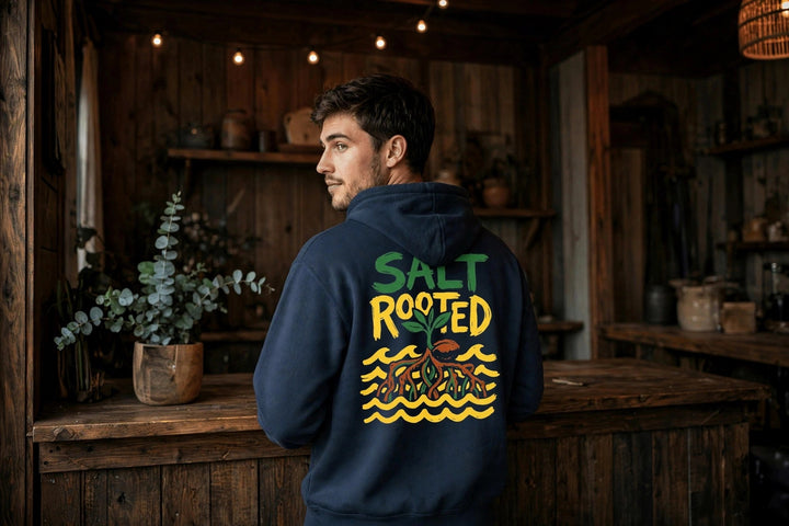 Salt Rooted Hoodie — in the Five Tides room, male back
