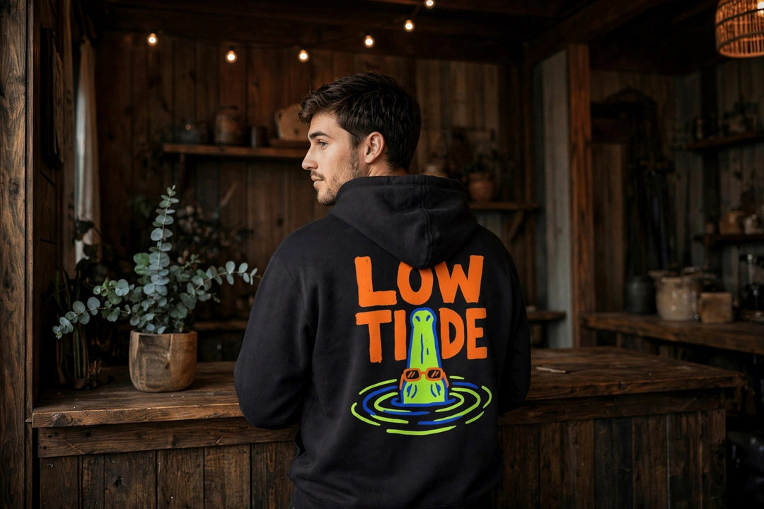 Low Tide Hoodie — in the Five Tides room, male back