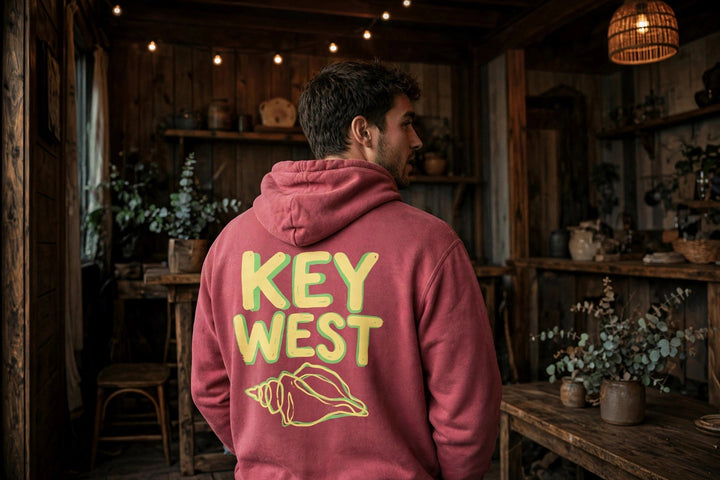 Key West Conch Shell Hoodie — in the Five Tides room, male back