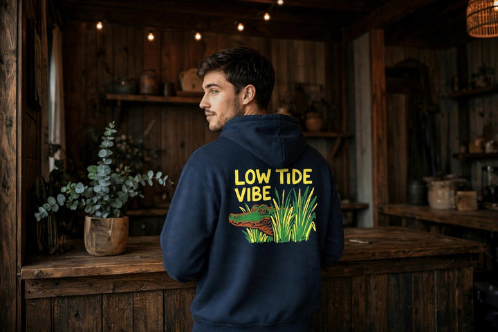 Low Tide Vibe Alligator Hoodie — in the Five Tides room, male back