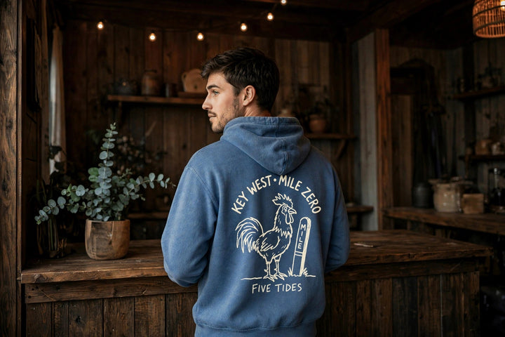 Key West Mile Zero Rooster Hoodie — in the Five Tides room, male back