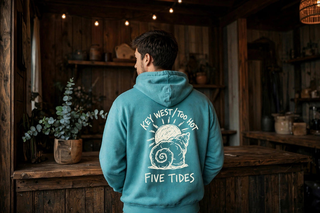 Beach Snail Hoodie — in the Five Tides room, male back