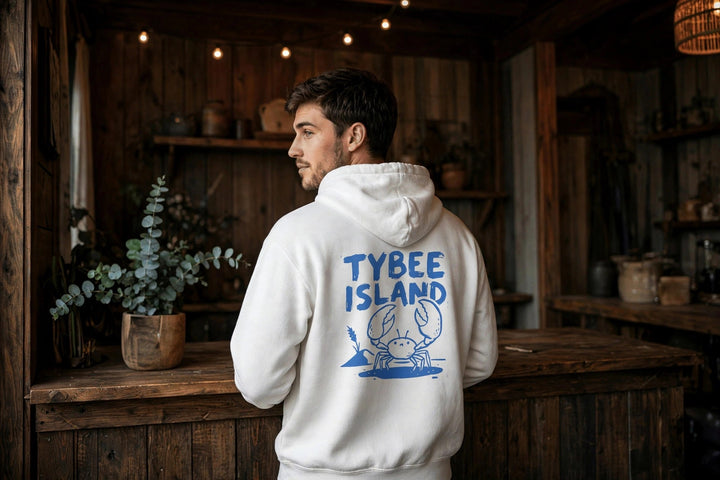 Tybee Island Crab Hoodie — in the Five Tides room, male back