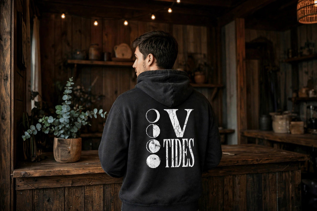 Moon Phases Hoodie — in the Five Tides room, male back