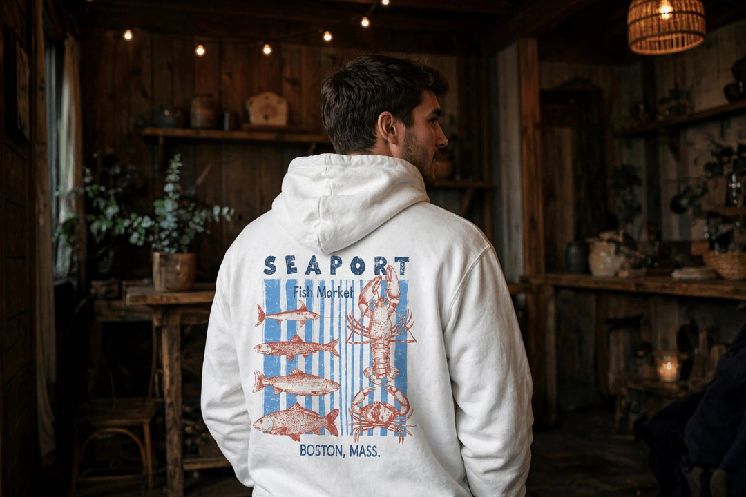 Boston Seaport Fish Market Hoodie — in the Five Tides room, male back