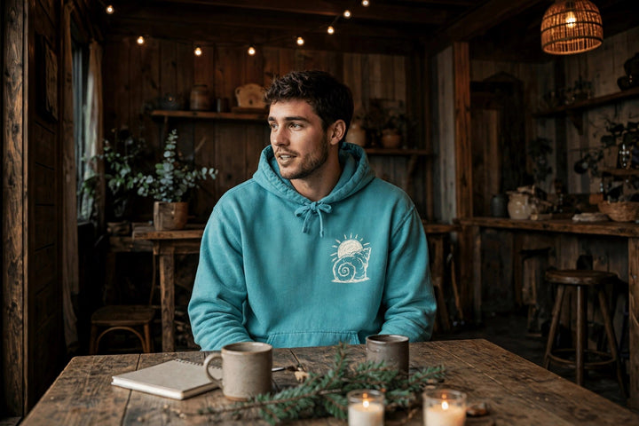 Beach Snail Hoodie — in the Five Tides room, male front