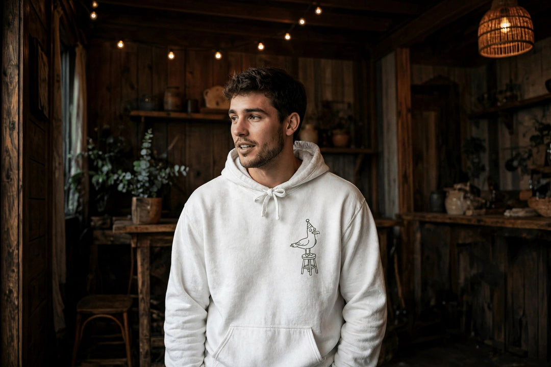 Cape May Dive Bar Hoodie — in the Five Tides room, male front