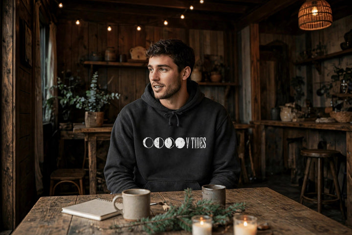 Moon Phases Hoodie — in the Five Tides room, male front