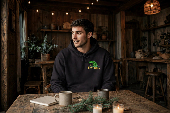 Low Tide Hoodie — in the Five Tides room, male front