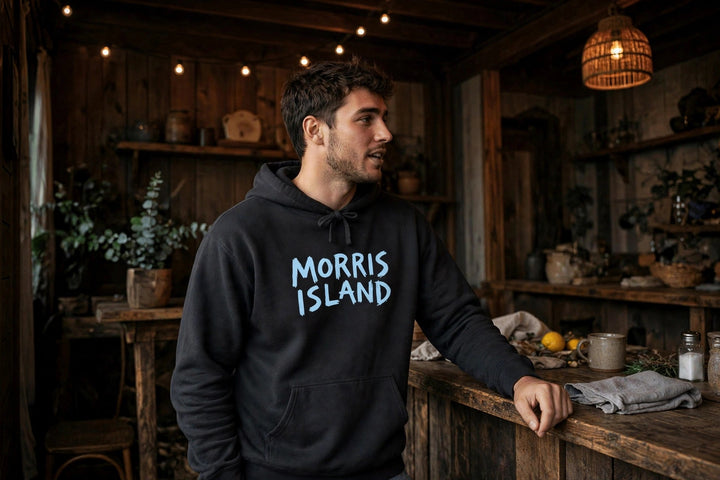 Morris Island Hoodie — in the Five Tides room, male front
