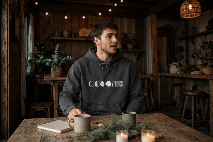 Moon Phases Vibes Hoodie — in the Five Tides room, male front