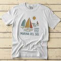 Marina Del Sol Sailboats white garment-dyed tee on weathered wood planks
