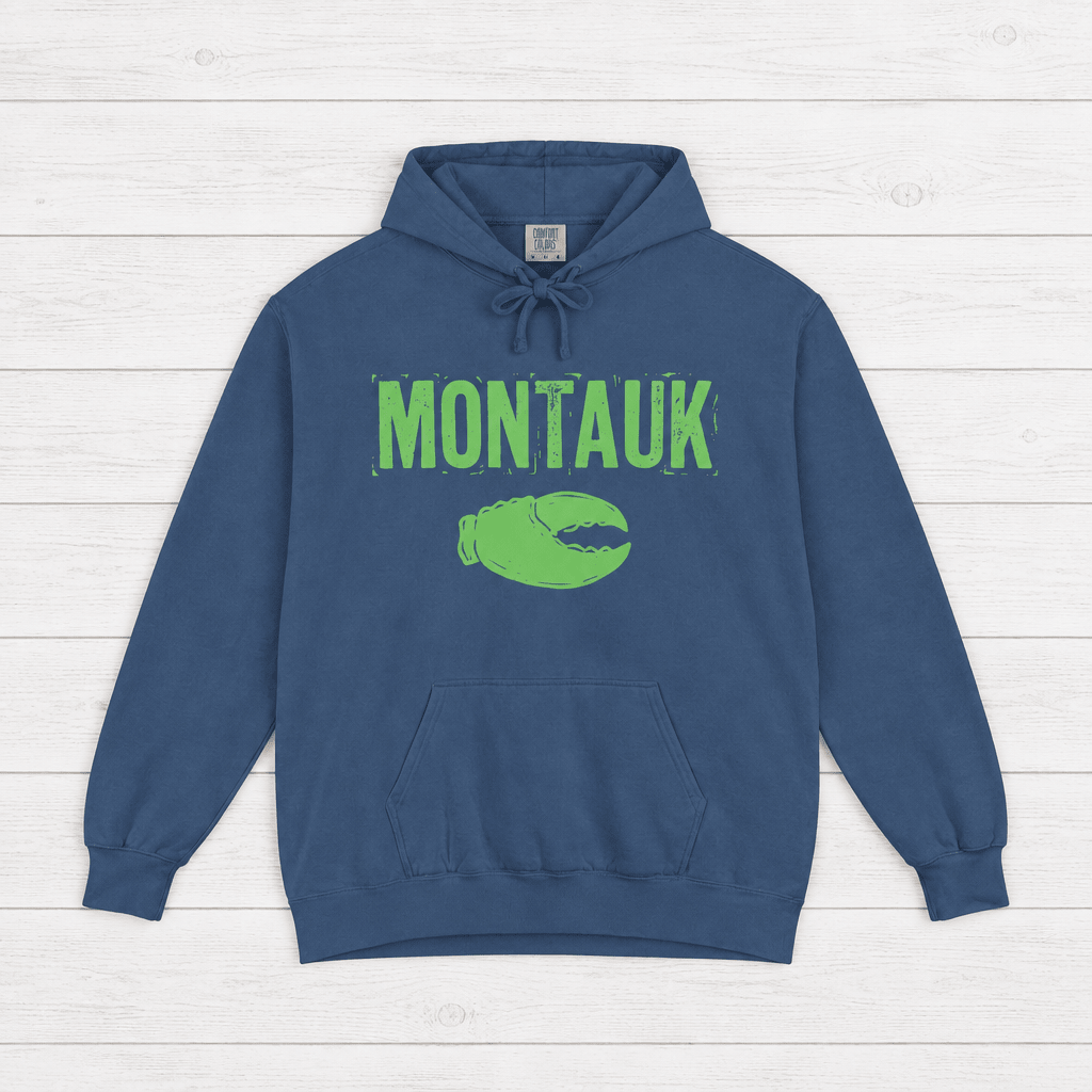 Denim Montauk hoodie front with distressed neon-green lettering and lobster-claw graphic by Five Tides Apparel