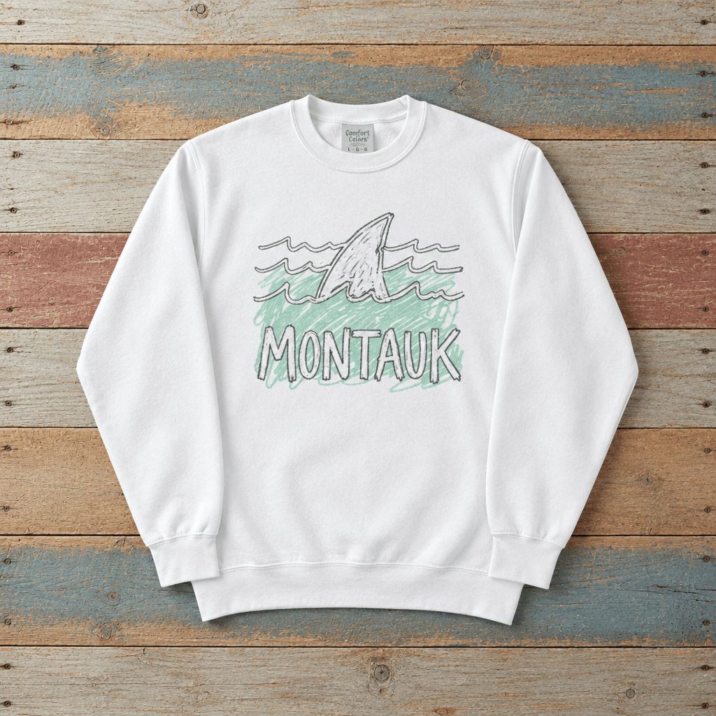 Montauk shark sweatshirt front in White with sea-green waves on colorful weathered driftwood boards