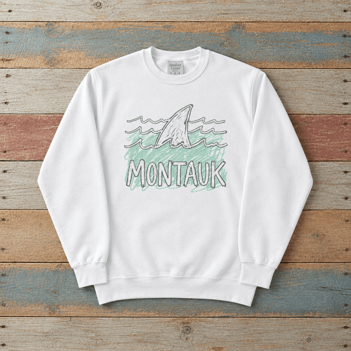 Montauk shark sweatshirt front in White with sea-green waves on colorful weathered driftwood boards