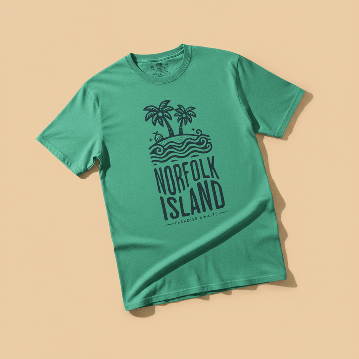 Norfolk Island Tee in Green — front graphic, warm sand studio background