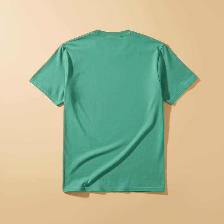 Palm Bliss Wildlife Oasis Tee in Mint Green — plain back, warm sand studio background