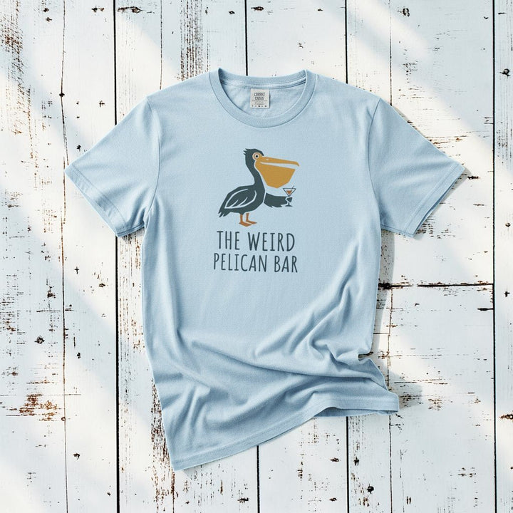 Pelican Bar chambray garment-dyed tee on weathered wood planks