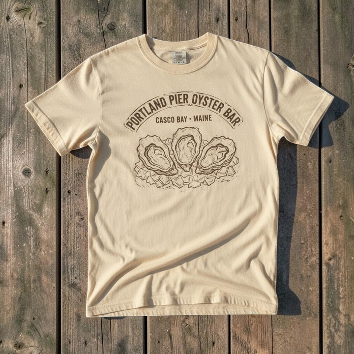 Portland Pier Oyster Bar Casco Bay Maine vintage seafood graphic t-shirt in Ivory casually, coastal lifestyle product photo