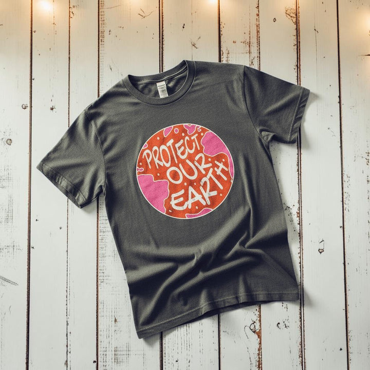 Protect Our Earth Dystopia pepper garment-dyed tee tossed on retro-grunge driftwood planks