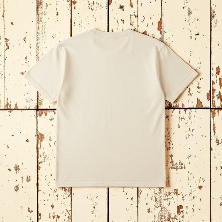 VW Bus Sunset Tee in Ivory/Natural — plain back, warm sand studio background