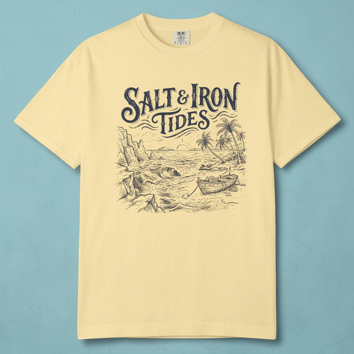 Flat lay - yellow Salt &amp; Iron Tides tee on weathered driftwood planks