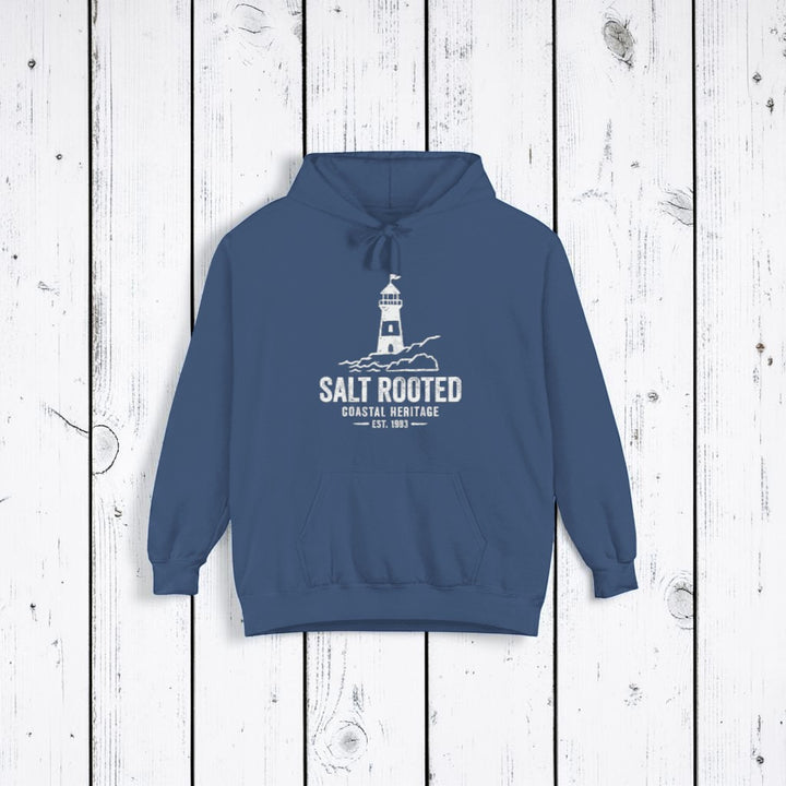 True Navy Salt Rooted lighthouse hoodie on sandy beige background — mobile product shot