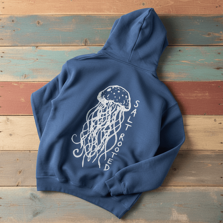 Salt Rooted Jellyfish Hoodie in Blue Jean — back graphic with hand-drawn jellyfish and SALT ROOTED lettering on driftwood