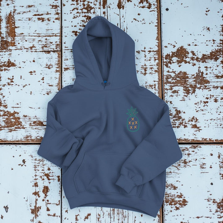 Salt Rooted Pineapple Hoodie in Steel Blue — front chest pineapple graphic on driftwood